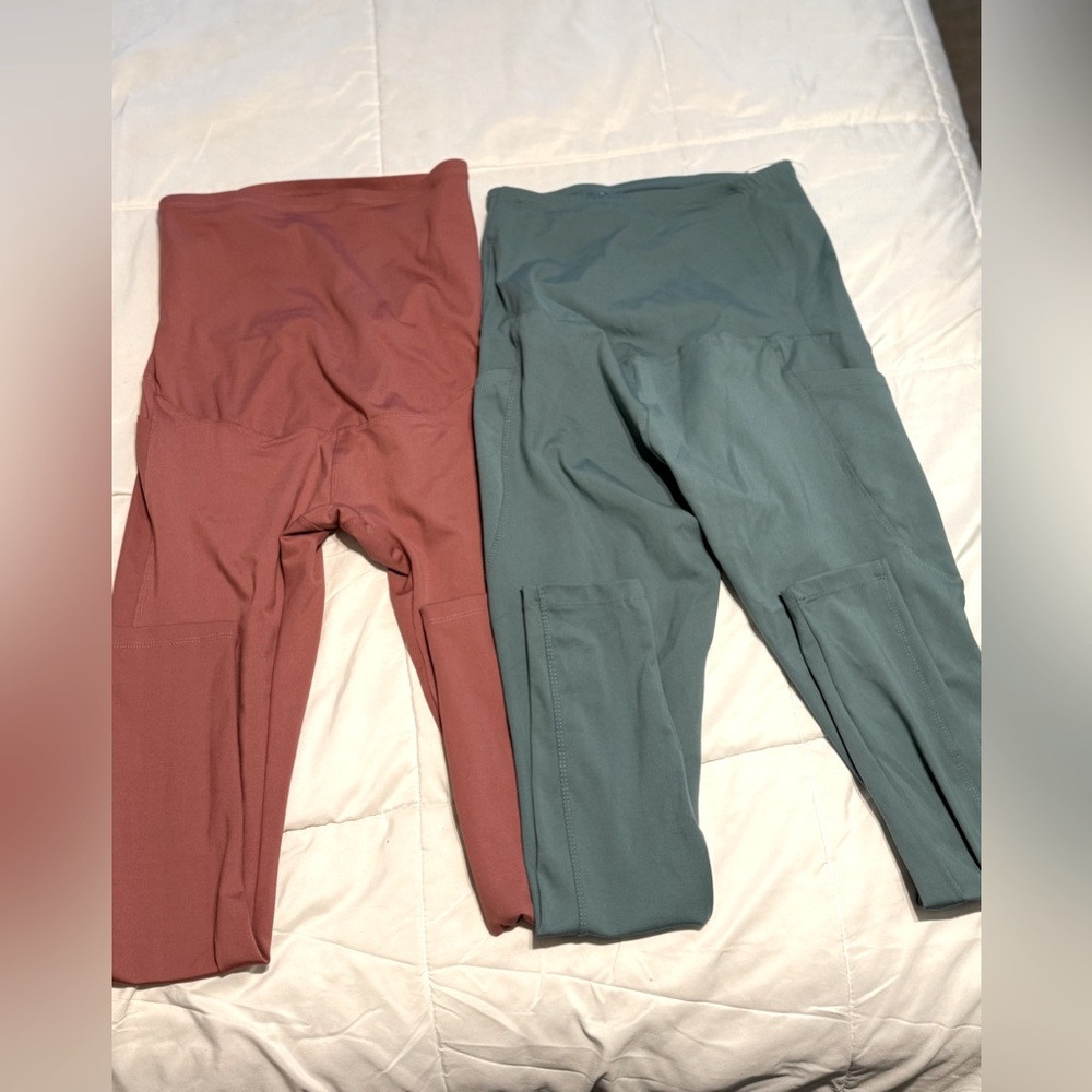 Pair of maternity leggings (pink and green) with cell phone holder/pockets M